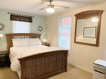 Primary bedroom with a queen bed